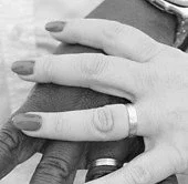 Couple showing wedding rings