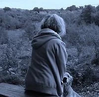 person sitting on bench